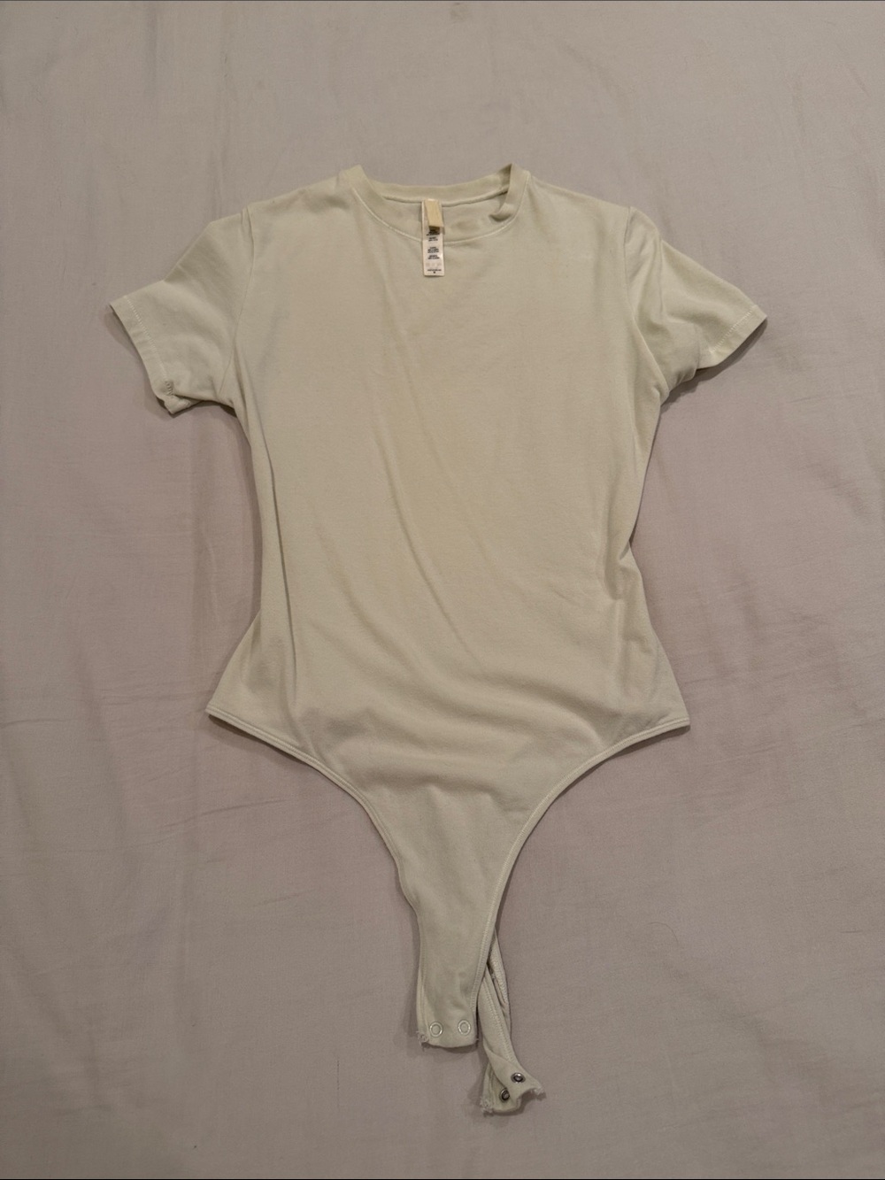 SKIMS Short Sleeve Bodysuit in Light Cream